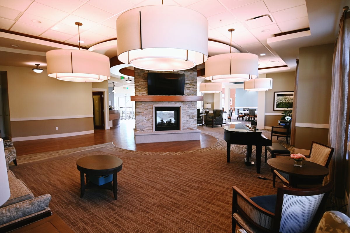 The great room, with its stone fireplace and vaulted ceiling